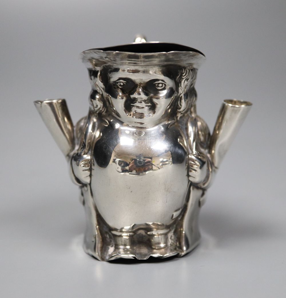 An Edwardian novelty silver mounted inkwell modelled as a Toby jug, London 1907, 68mm, weighted.